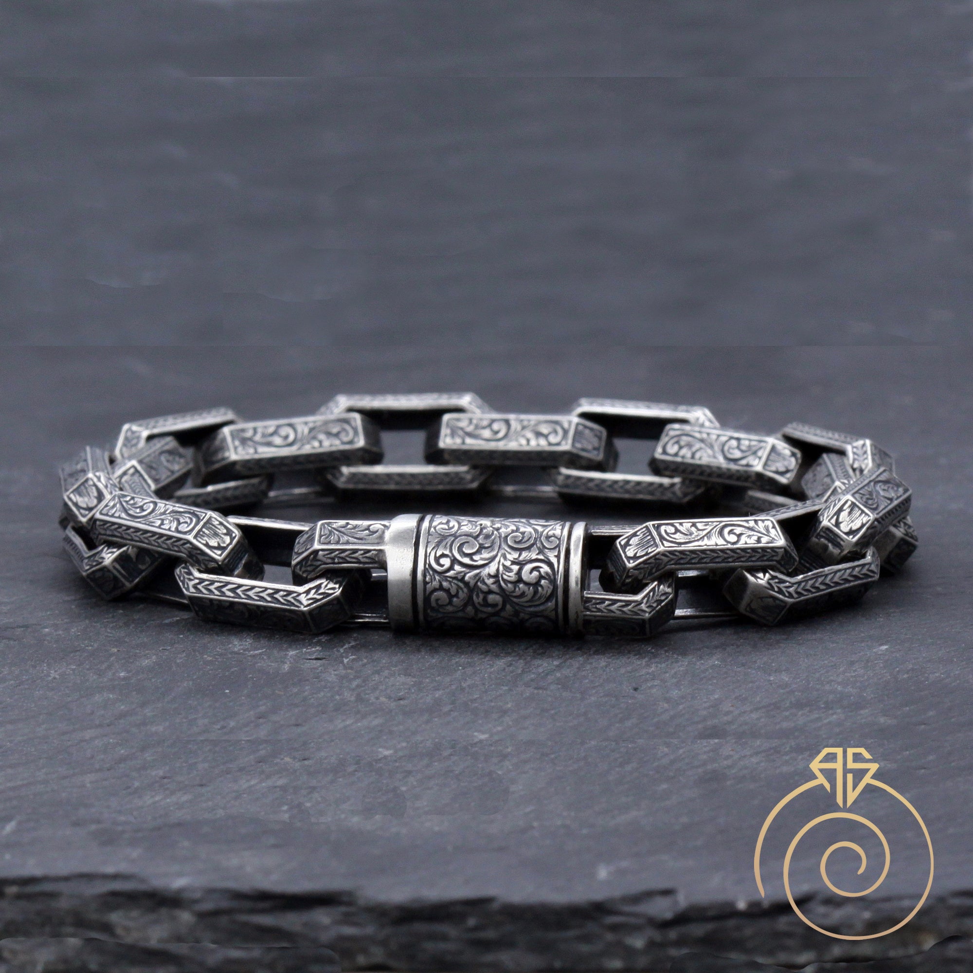 Unisex Sterling Silver Pendant Bracelet from Bali - Sweet Scent | NOVICA